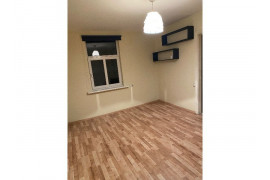 Two separate rooms and kitchen with wood heating